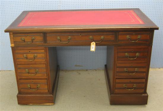 Appraisal: Early th century walnut pedestal desk with nine drawers h