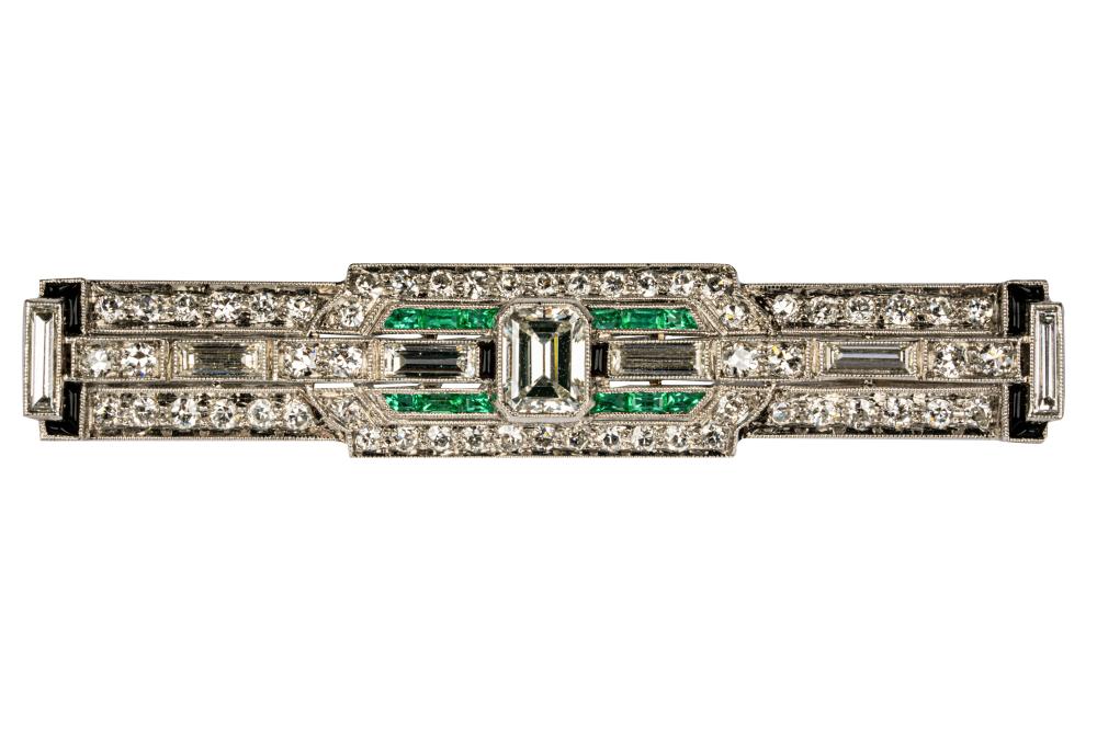 Appraisal: ART DECO PLATINUM DIAMOND EMERALD ONYX BAR BROOCHcentering one emerald