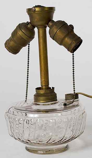 Appraisal: Electrified Oil Lamp American an electrified oil lamp with cut