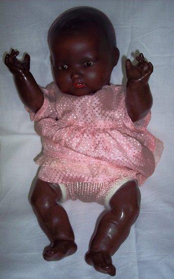 Appraisal: An Armand Marseille black doll the head marked A M