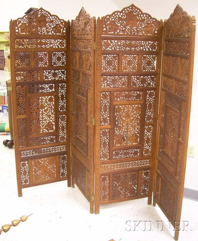 Appraisal: Indian Carved and Reticulated Hardwood Four-Panel Floor Screen ht panel