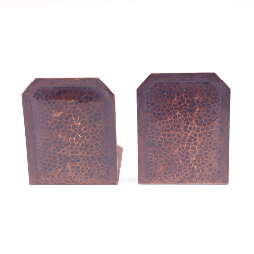 Appraisal: GUSTAV STICKLEY Hammered copper rectangular bookends with clipped corners Original