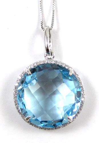 Appraisal: BLUE TOPAZ AND DIAMOND PENDANT NECKLACE The inch box link