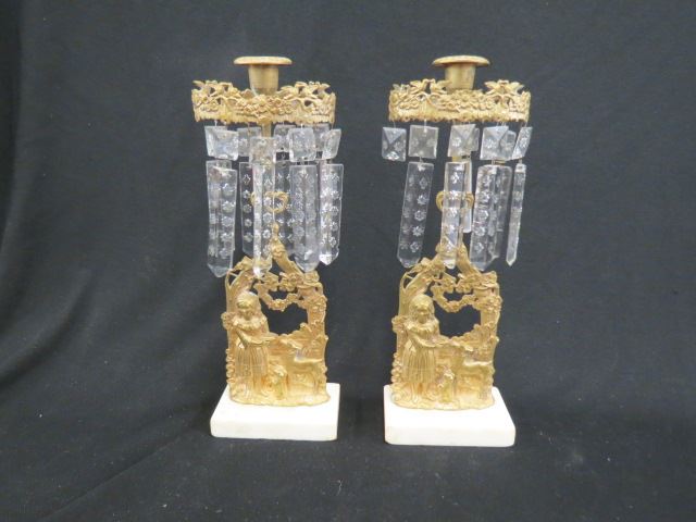 Appraisal: Pair of Brass Figural Candlesticks marble bases fancy prisms