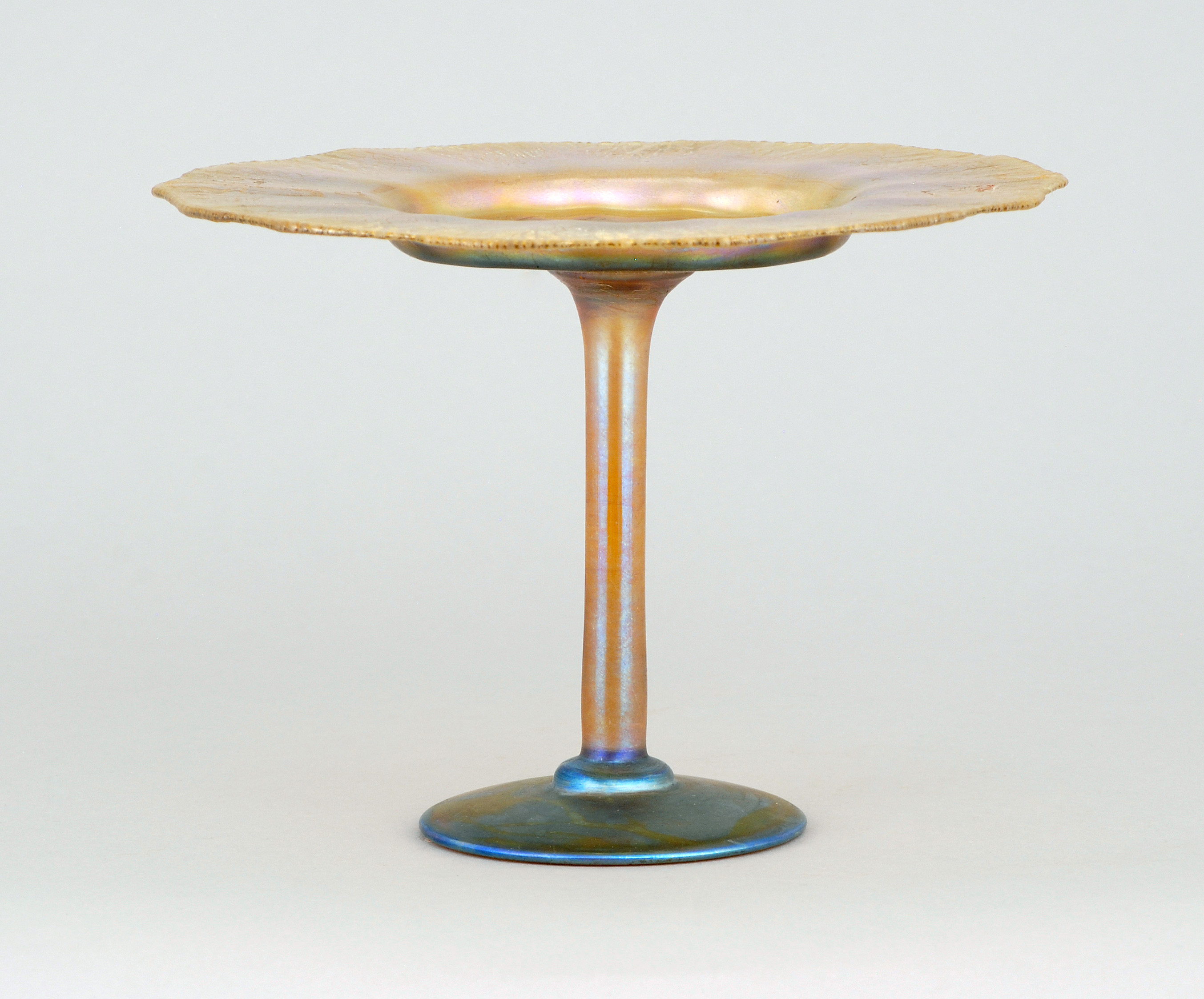 Appraisal: LOUIS COMFORT TIFFANY TAZZA Late th Early th CenturyIn iridescent