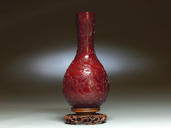 Appraisal: QIANLONG CARVED RUBY RED GLASS VASE Tall and rare Chinese