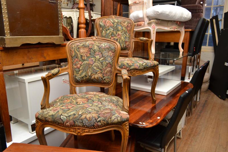 Appraisal: A PAIR OF FRENCH STYLE FLORAL UPHOLSTERED ARMCHAIRS A PAIR