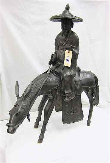 Appraisal: FIGURAL BRONZE FLOOR SCULPTURE Asian man on donkey Height inches