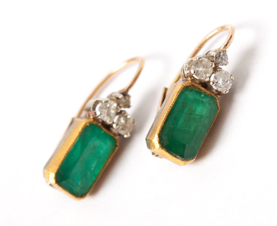 Appraisal: Pair of emerald diamond gold leverback earrings each one-step cut