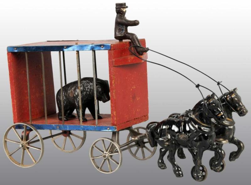 Appraisal: Cast Iron Wood Arcade -Horse Circus Wagon Toy Description Deluxe