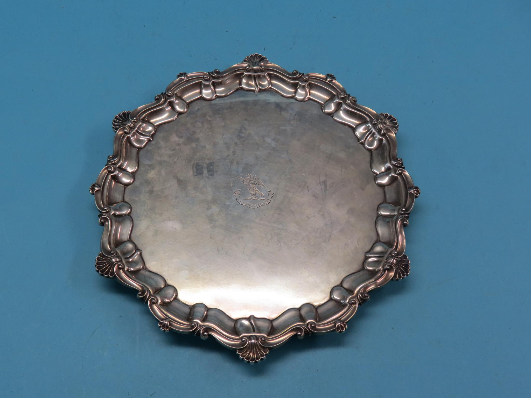 Appraisal: A large silver salver circular-shape with shell and scroll rim