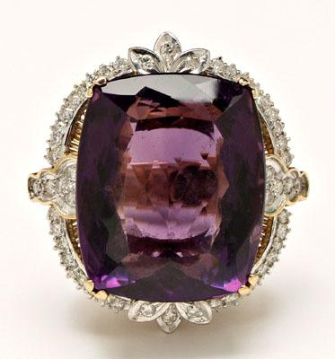 Appraisal: Amethyst diamond ring central cushion faceted amethyst estimated weight cts