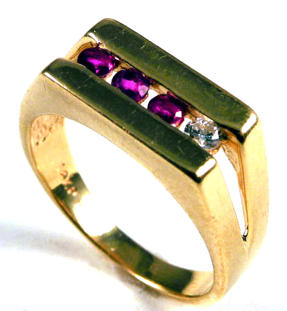 Appraisal: MAN'S RUBY AND DIAMOND RING k yellow gold with three