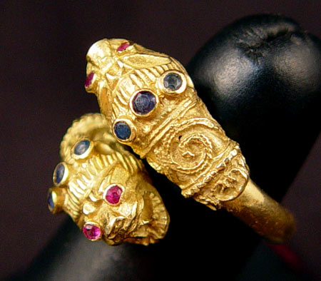 Appraisal: K FOO LION DOG FIGURAL BYPASS RING Etruscan ring with