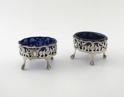 Appraisal: A pair of George II silver salt cellars oval form