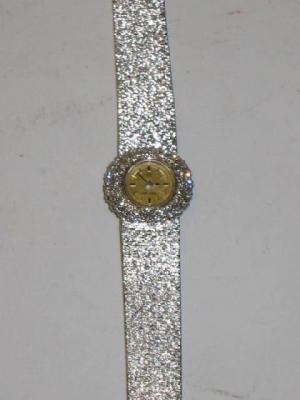 Appraisal: A LADY'S OMEGA WRIST WATCH in diamond set ct white