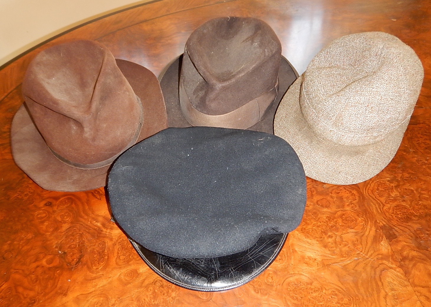 Appraisal: A sailor's peak cap by Gieves Limited a deerstalker and