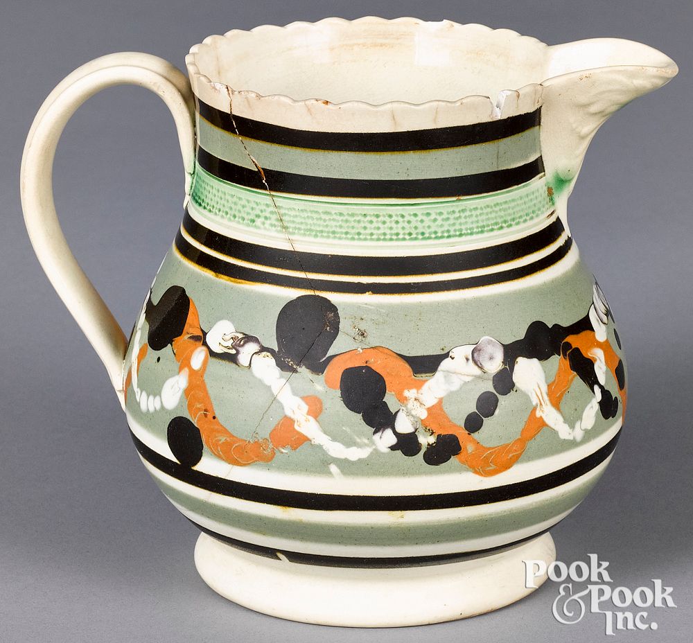 Appraisal: Mocha pitcher Mocha pitcher with white tan and brown interlacing