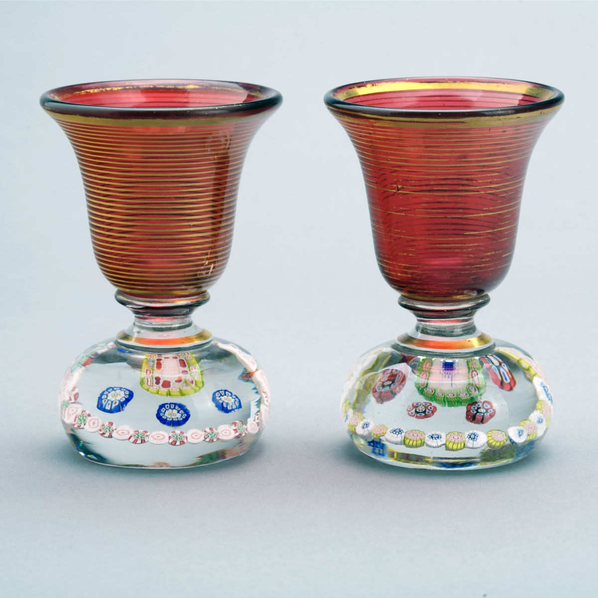 Appraisal: NEAR PAIR OF VENETIAN WINE GLASSES WITH SCATTERED MILLEFIORI BASES