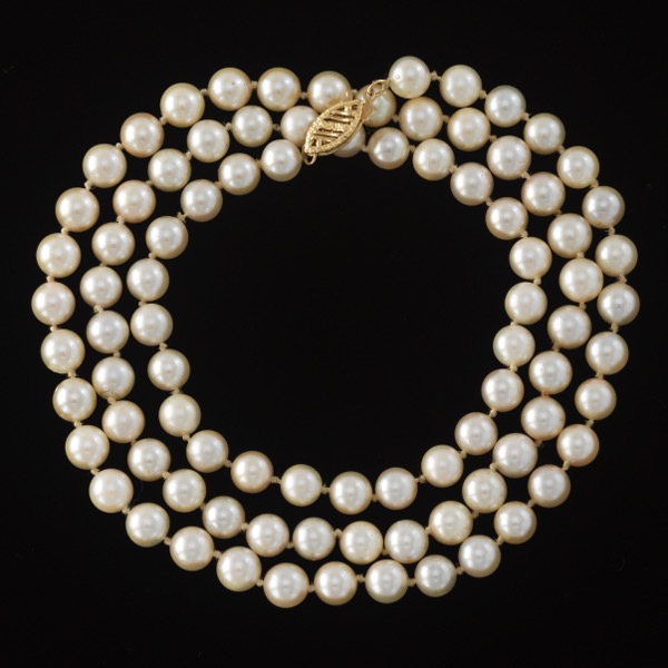 Appraisal: MATINEE MM PEARL NECKLACE WITH FILIGREE CLASP L k yellow