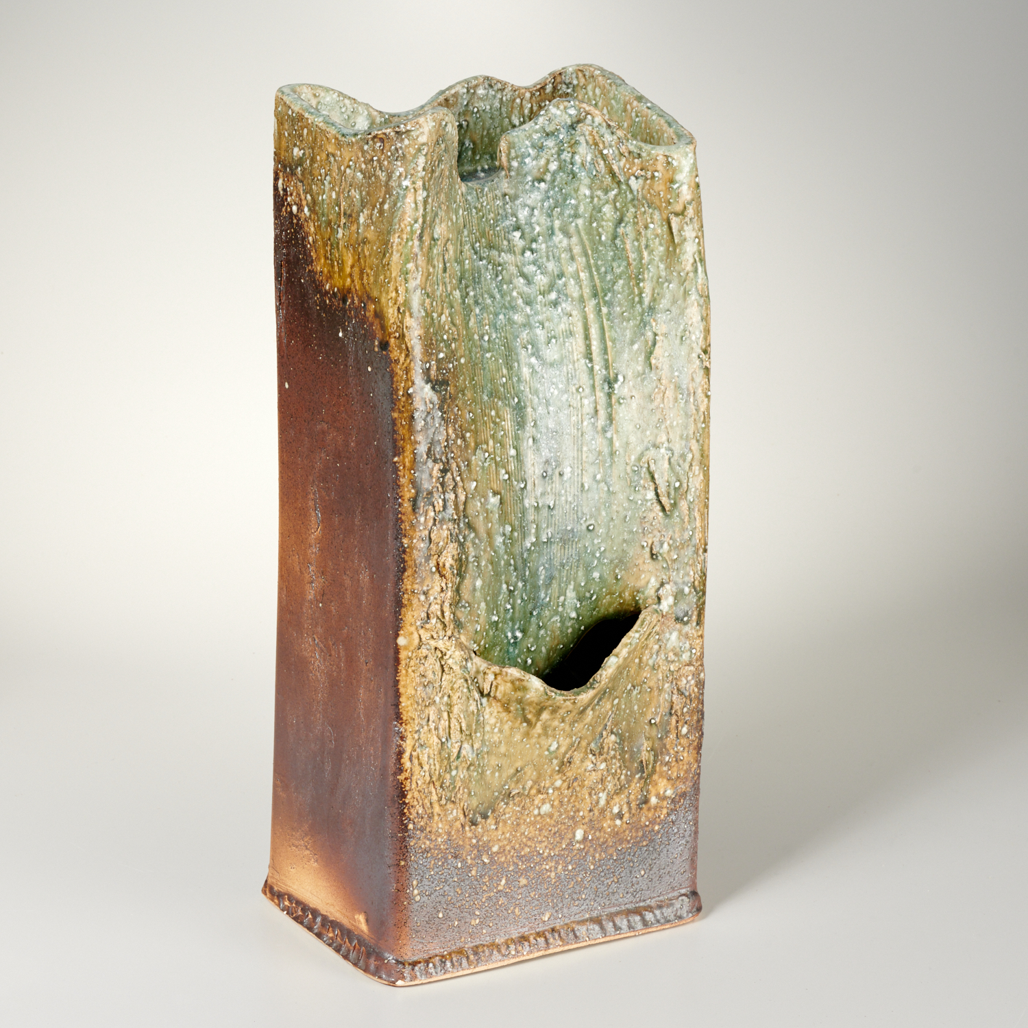 Appraisal: CONTEMPORARY CERAMIC FOUNTAIN Roughly textured surface with green and brown