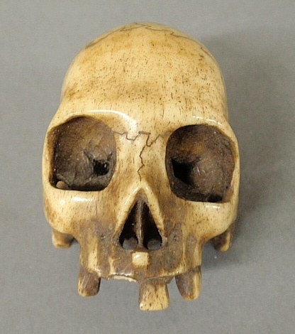 Appraisal: - Chinese carved skull form netsuke th c h x