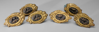 Appraisal: Set six brass curtain tiebacks patinated putti with ribbons and