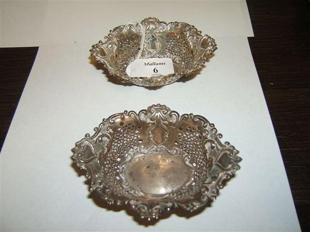 Appraisal: A pair of Edwardian silver bon-bon baskets with pierced star