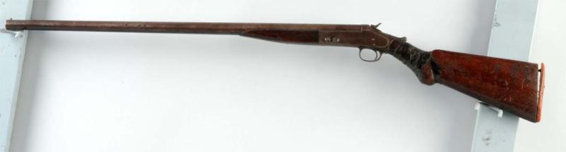 Appraisal: Single Barrel Shotgun Description S Walnut Early black powder shell