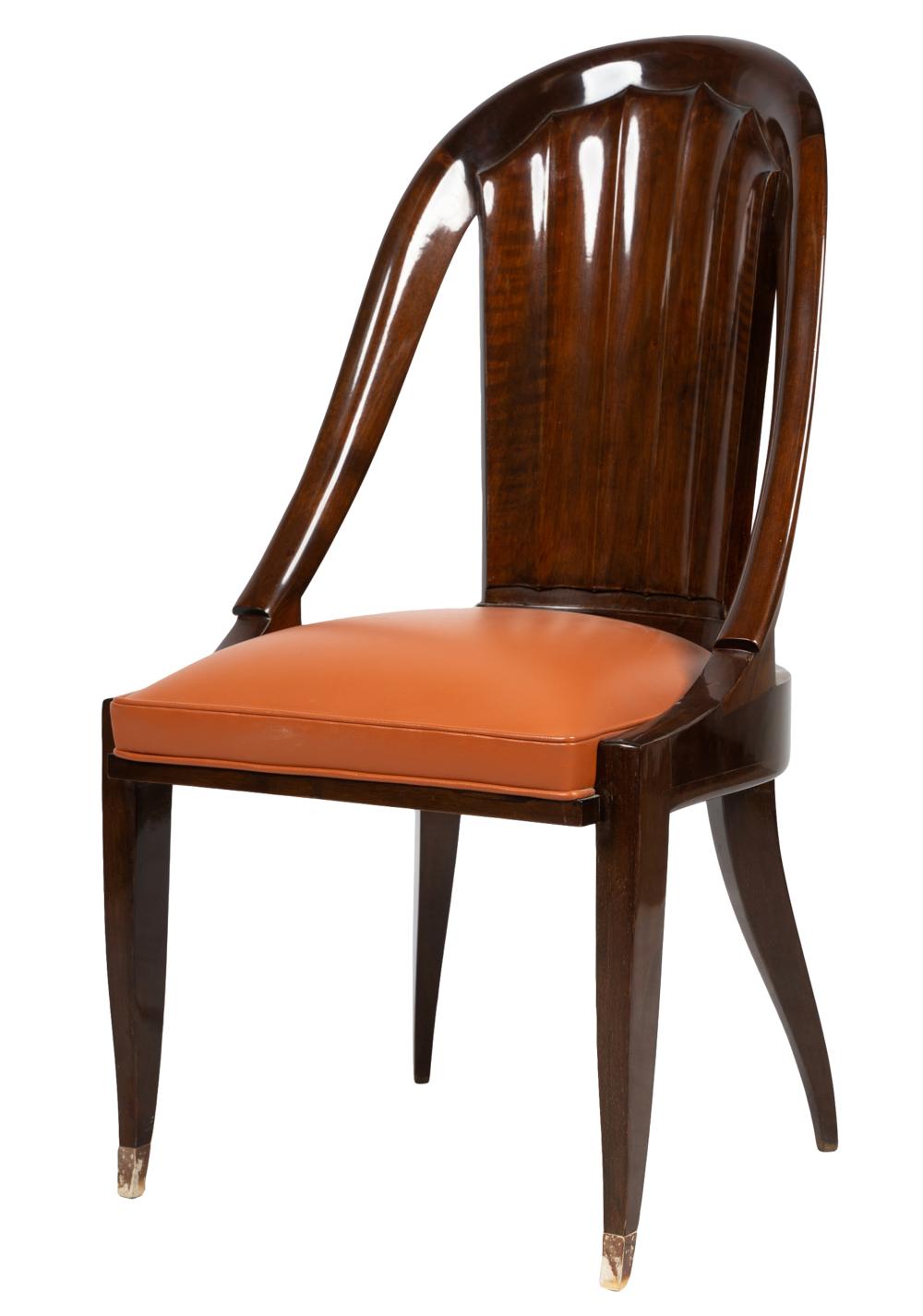 Appraisal: MILE-JACQUES RUHLMANN PALETTE CHAIRwith sculpted gondola backrest over an orange-red