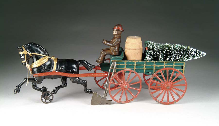 Appraisal: ONE HORSE WAGON BY HUBLEY Green wagon with gold highlights