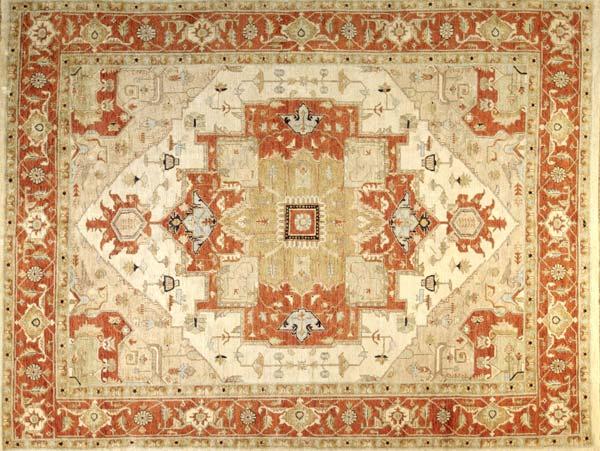 Appraisal: PESHAWAR SERAPI Room-size rug with a terra-cotta and mustard geometric