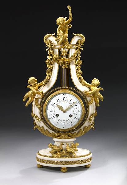 Appraisal: A French gilt bronze mounted marble mantel clock early th