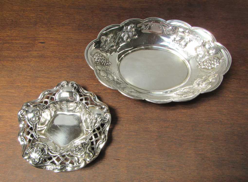 Appraisal: TWO STERLING SILVER REPOUSSE BOWLS one oval form with grape