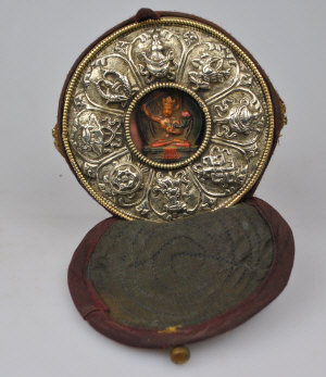 Appraisal: A Tibetan Monk's travelling shrine centred with a deity in