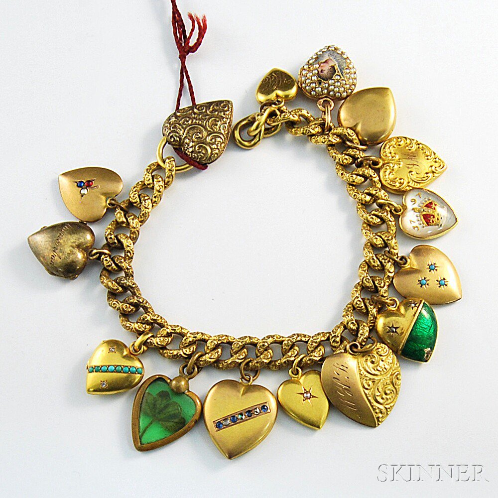 Appraisal: Antique Charm Bracelet the kt gold bracelet with mostly gilt-metal