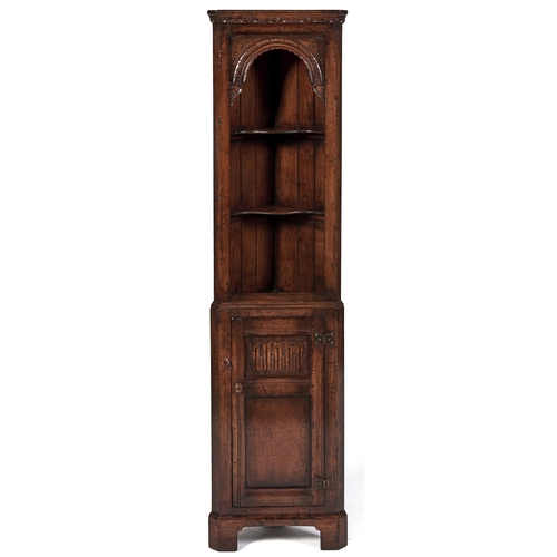 Appraisal: A dwarf oak standing corner cupboard second half th c