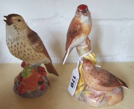 Appraisal: A Royal Worcester china group of birds Linnets - No