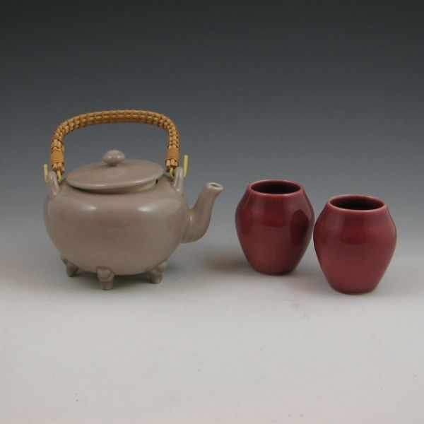 Appraisal: Rookwood lidded teapot in gray with two cabinet vases in