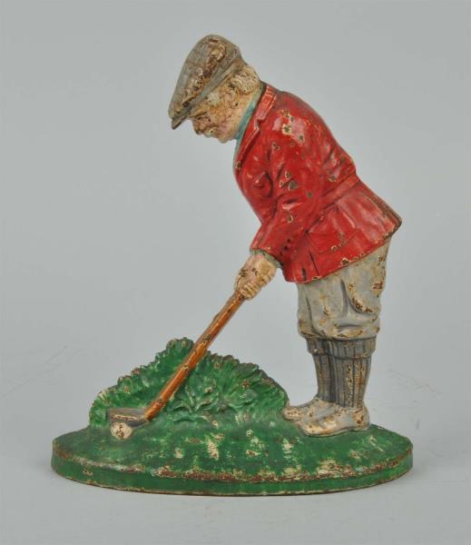 Appraisal: Cast Iron Putting Golfer Doorstop Made by Hubley and numbered