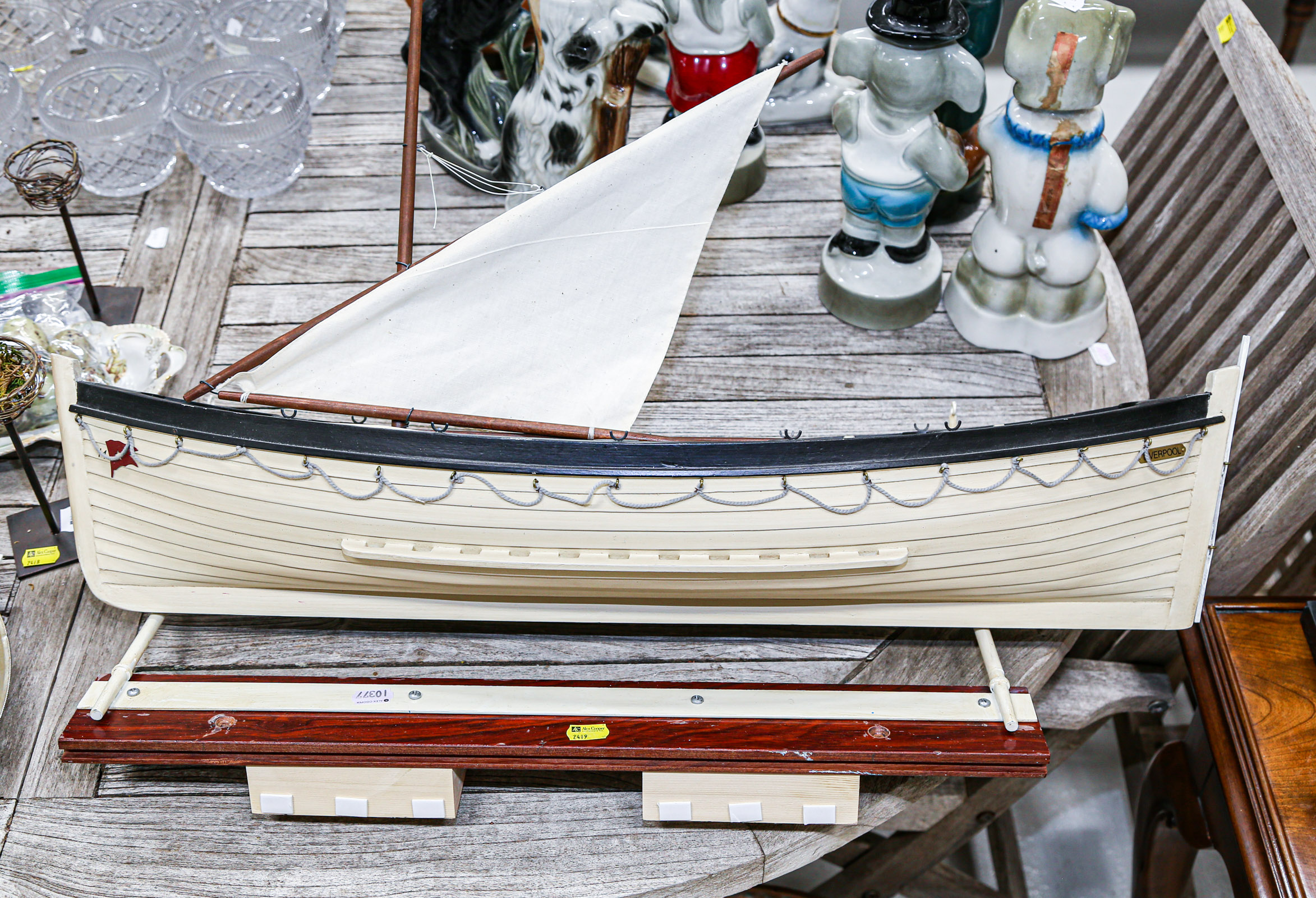 Appraisal: CARVED WOOD LIFE BOAT MODEL Representing a lifeboat from the