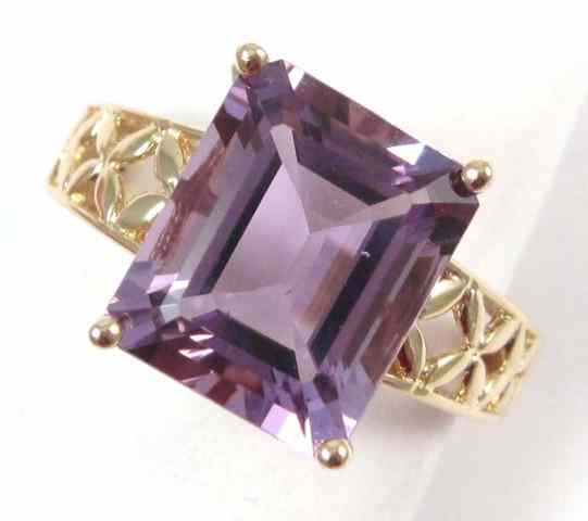 Appraisal: AMETHYST AND FOURTEEN KARAT GOLD RING four yellow gold prongs