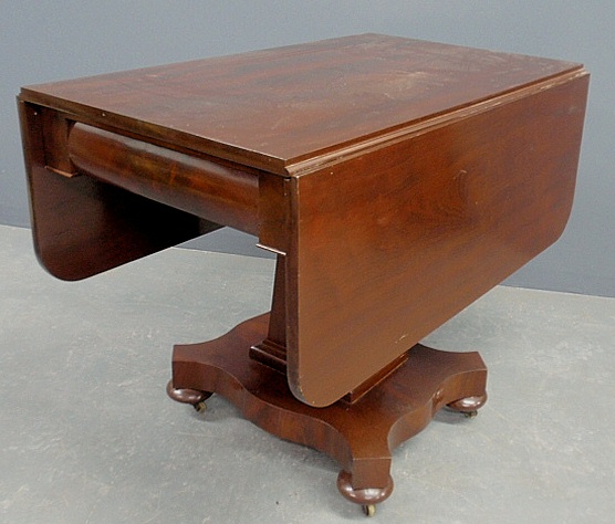 Appraisal: - Classical mahogany drop-leaf table c with two drawers h