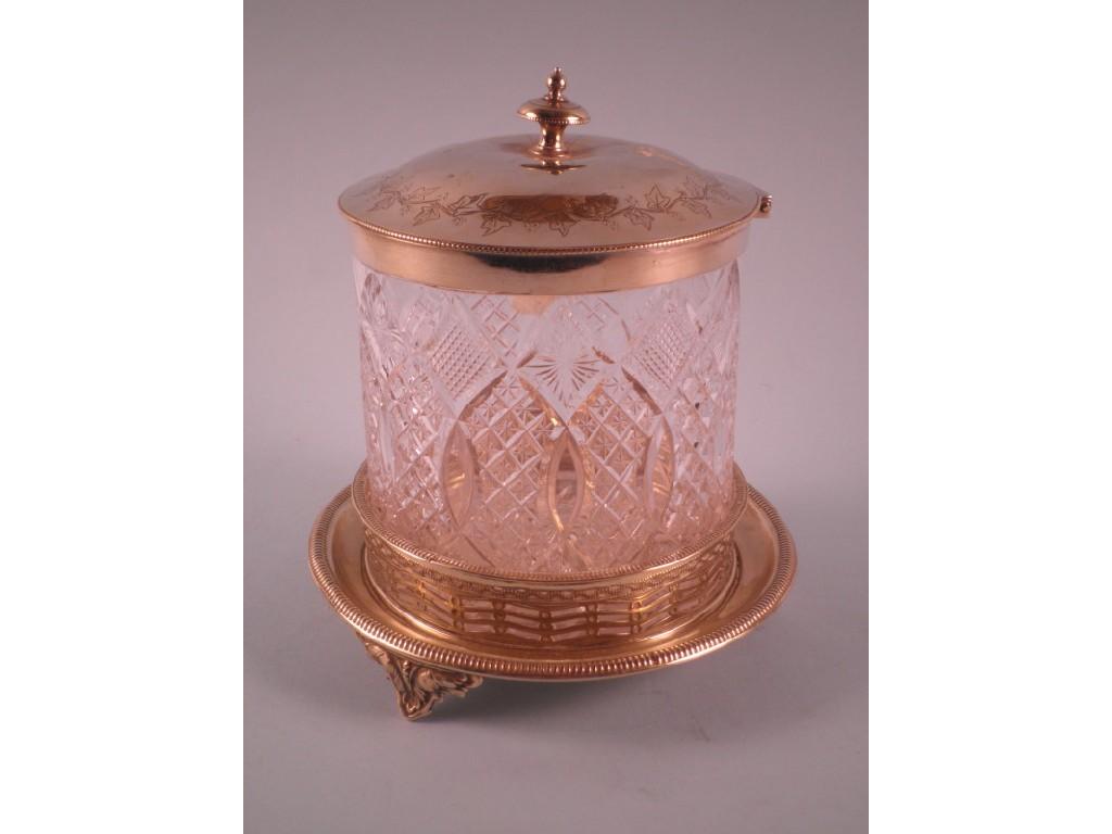 Appraisal: A cut glass biscuit barrel with silver plated mounts the