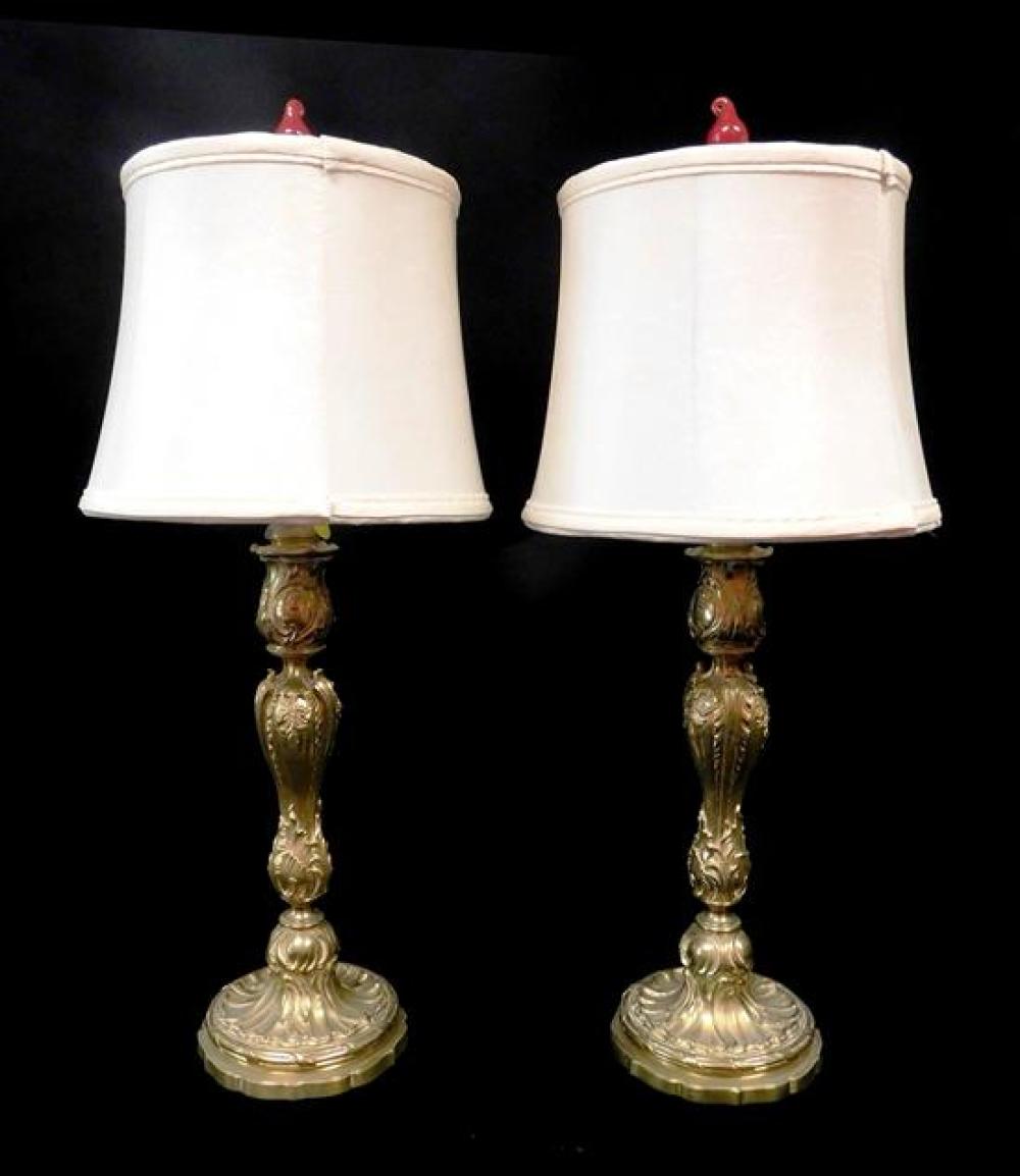 Appraisal: Pair of Rococo style metal candlesticks converted to table lamps