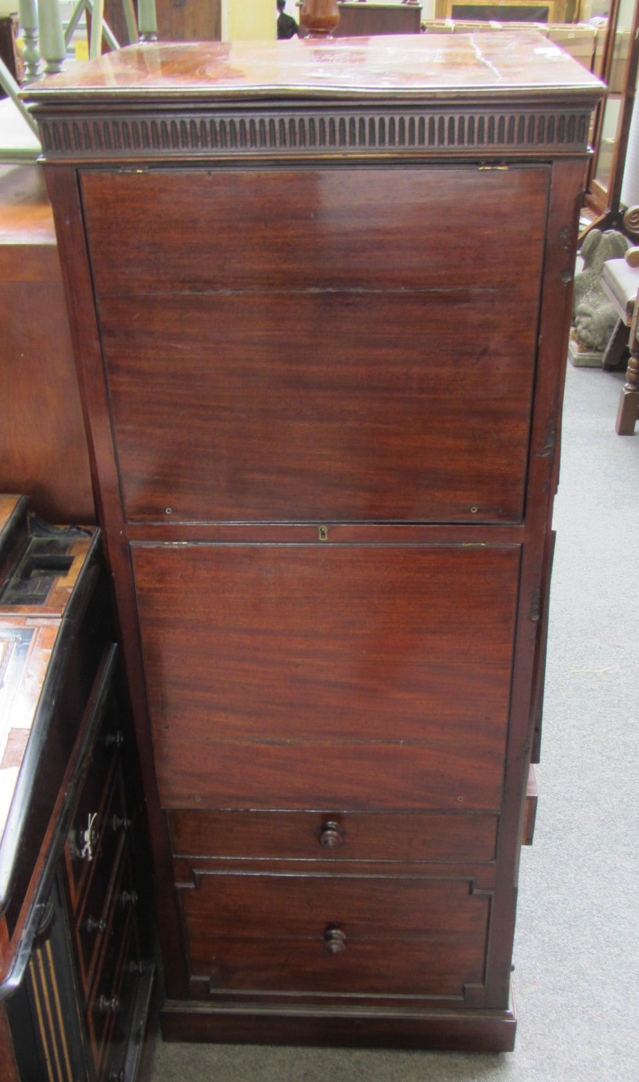 Appraisal: A th century mahogany freestanding library bookstand reading table with