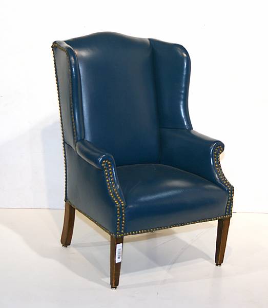 Appraisal: A George III style mahogany child's wing chair th century