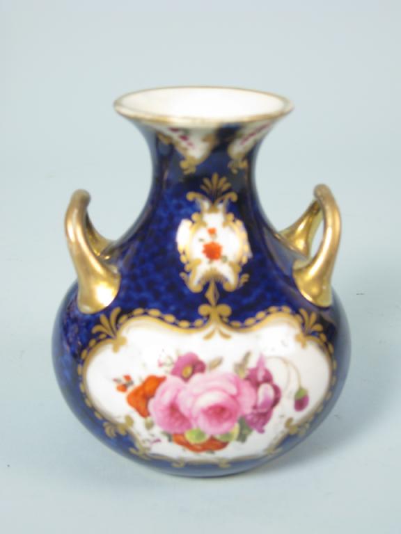 Appraisal: A th Century porcelain two handled Vase painted floral bouquets