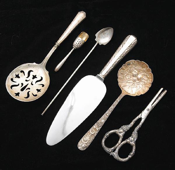 Appraisal: A group of sterling flatware Comprising hand wrought platter spoon