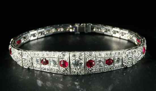 Appraisal: EDWARDIAN PLATINUM DIAMOND AND RUBY FLEXIBLE LINK BRACELET Tapering openwork